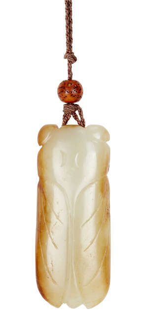 
	
		A Chinese green jade 'cicada' pendant, 18th century, carved with wings tucked against the...