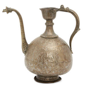 A Mughal engraved brass ewer, North India, 18th century, of typical form with curved handle and slightly curved spout, engraved with an dense design of flowers