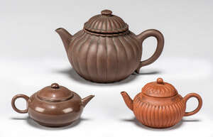 The Robert G. Vater Collection
Three Chinese Yixing teapots and covers
Late Qing dynasty and...