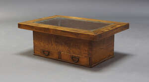 
	
		A Japanese elm hibachi converted to a low table, the rectangular top with copper lined...