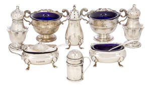 
	
		A collection of small silver cruets comprising a pair of star baluster shaped peppers,...
