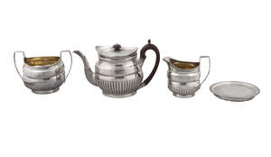 A George III silver four piece tea service, London c.1801, Robert Hennell I, David Hennell II & Samuel Hennell, comprising teapot, milk jug, twin handled sugar
