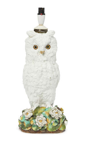 
	
		A Victorian porcelain oil lamp base, in the form of an owl, modelled perched on a rock...