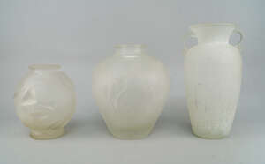 
	
		An Art Deco frosted glass globular vase, early 20th century, moulded with stylised tulip...