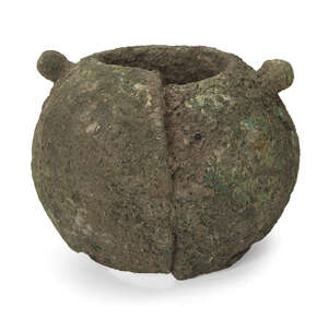 
	
		A Chinese bronze bangle, Neolithic period, of broad, rounded form, heavily encrusted and...