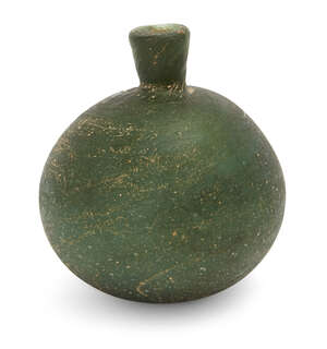
	
		A green glass flask, Persia, 9th century, of spherical form, 11cm. high
		 

	

