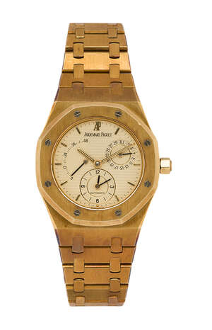 
	
		An 18ct gold 'Royal Oak' dual time automatic wristwatch by Audemars Piguet, ref. 25730BA 