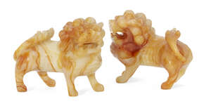 
	
		A pair of Chinese hardstone Buddhist lions, early 20th century, carved standing four...