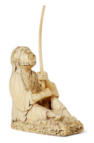 
	
		A Chinese ivory figure of a fisherman, Ming dynasty, carved seated on a base of stylised...