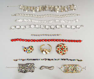 
	
		A large collection of costume jewellery, to include a rock crystal necklace with silver...