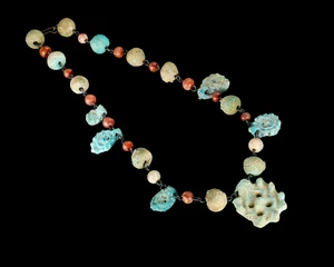 A faience and carnelian bead necklace on silver wire,Iran, 6th century and later&nbsp;
With turquoise...