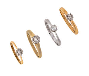 
	
		A group of four diamond single stone rings, each claw set with a brilliant-cut diamond,...