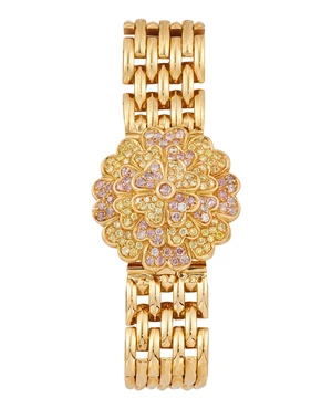 Corum. An 18ct gold diamond set quartz watch with custom cover and braceletReference 24.212.65,...