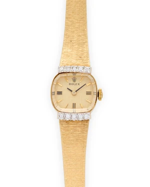 Rolex. A manual wind diamond set bracelet watch Reference 8374, Case number 50610, Circa 1970 Calibre 1400 manual wind movement, textured champagne dial with