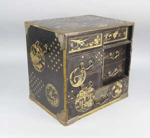 
	
		A Japanese black lacquer table cabinet, late 19th century, with two shaped handles, the...