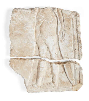 
	
		An Egyptian style limestone relief, carved with the profile of an Amarna style princess...