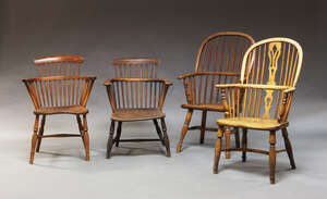 
	
		An elm and ash Windsor armchair, 19th Century, the hoop back with pierced central splat,...