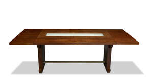 Paul Dupré-Lafon (1900-1971), a rosewood, oak and nickel plated metal drop-leaf dining table/...