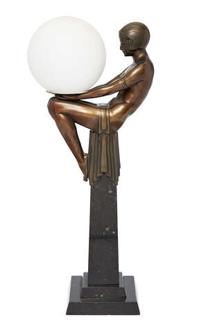 
	
		Art Deco, a patinated metal figural lamp with glass shade and marble base
		Second...
