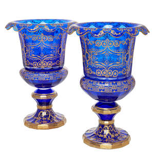 
	
		A pair of impressive Bohemian blue and gilt facetted campana urns, in the late 19th...