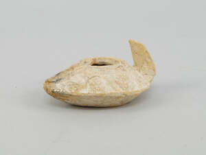 
	
		A Roman pottery oil lamp, decorated with trailing lines of grapes and vines, 9.5cm...