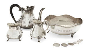 
	
		A three-piece Indian silver tea set, comprising a tea pot, milk jug and sugar pot, each...