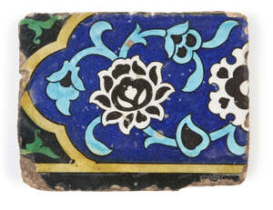 
	
		A Dome of the Rock cuerda seca border tile, Syria, circa 1550-1600, of rectangular form,...