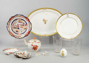 A porcelain Easter egg, Imperial Porcelain Manufactory, Period of Nicholas II( 1894-1917), 6.5cm high (a/f) , together with a pair of glass beakers, engraved w