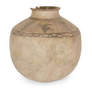 A buff pottery vessel, the sloping shoulders decorated in added umber with four pairs of aquatic...