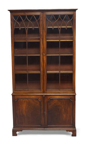 
	
		A George III mahogany bookcase, the moulded cornice above pair of glazed doors, enclosing...