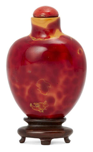 
	
		A Chinese simulated realgar snuff bottle, 18th century, of flattened ovoid form, 6cm...