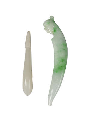 
	
		Two Chinese jade belthooks, early 20th century, both carved with dragon's head terminal,...