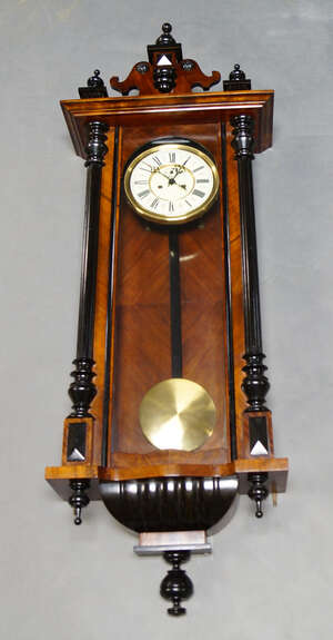 
	
		A mahogany and ebonised Vienna regulator, early 20th Century, the enamel dial with Roman...