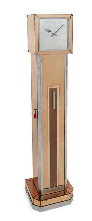 
	
		English Art Deco, a peach mirror-glass, walnut and chromium platedclock cocktail cabinet...
