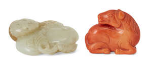 
	
		A Chinese celadon jade 'lingzhi' pendant and a coral horse, 19th century, the pendant...