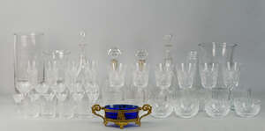 
	
		Two pairs of clear glass decanters with stoppers, one pair with silvered metal collars,...