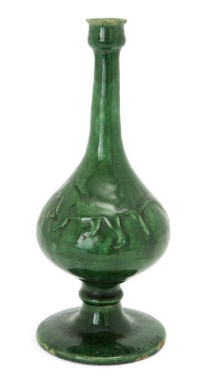 
	
		A Safavid green-glazed pottery sprinkler, Persia, 17th century, 
		of drop shape rising...