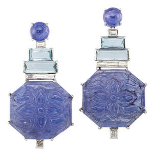
	
		A pair of tanzanite, aquamarine and diamond earrings, the floral carved octagonal...