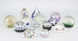 
	
		A Baccarat glass paper weight, inset to the interior with a figure of Taurus the bull,...