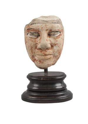 
	
		An Egyptian limestone head, Late Period-Ptolemaic Period, circa 664-30 B.C., depicted...