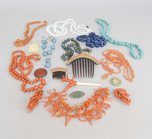
	
		A collection of costume jewellery to include two coral bead mounted hair combs, coral...