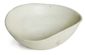 
	
		Bernard Leach (1887-1979), a shallow bowl 
		c.1945, impressed pottery and personal...