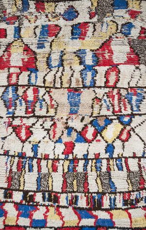 
	
		A Moroccan handwoven long pile wool rug
		Second quarter 20th century
		Woven with...