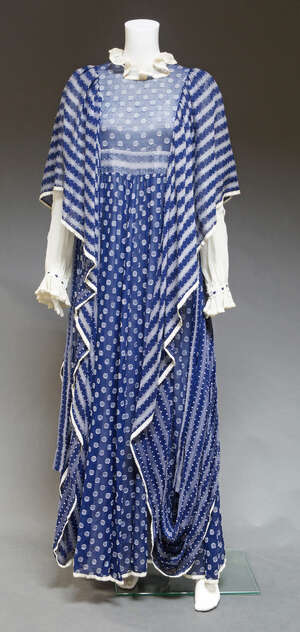 
	
		A 1970s Gina Fratini navy blue and white woven cotton lawn evening dress, muslin collar...