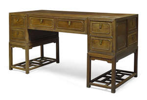 
	
		A Chinese hongmu partner's desk, late Qing dynasty, with arrangement of six drawers to...