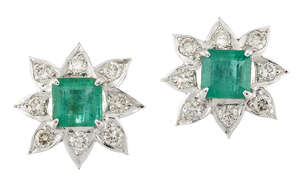 
	
		A pair of emerald and diamond cluster earrings, of flowerhead design, each cut-cornered...
