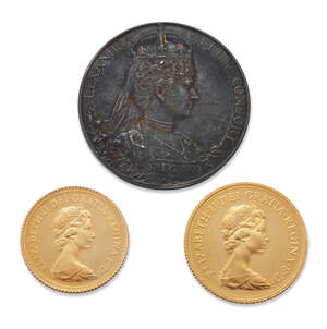 
	
		A proof Sovereign and half Sovereign and a commemorative medal for the 1902...