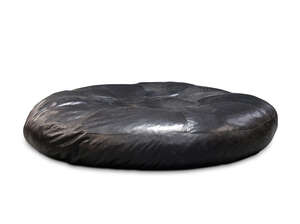
	
		Attributed to De Sede, a large circular back leather lounger, c,.1990, approx. 47cm high...