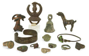 
	
		A miscellaneous group of bronze jewellery and artefacts
		1st Millennium B.C.  1st...