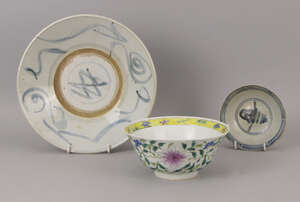 
	
		A Chinese porcelain bowl, 18th century, decorated with flowerheads and trailing leaves,...